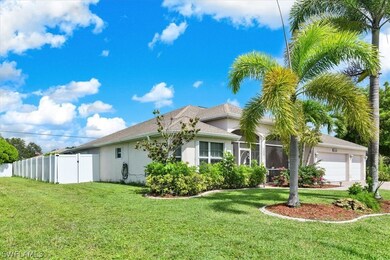 White low-maintenance privacy fence with dbl gate on each side.