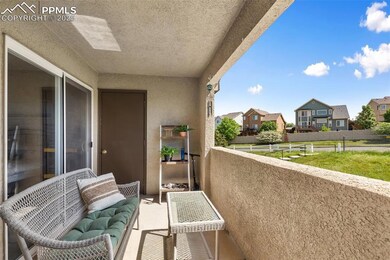 Balcony featuring a residential view