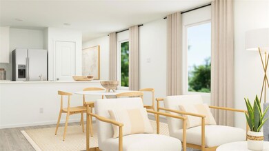 Living area featuring light hardwood / wood-style 