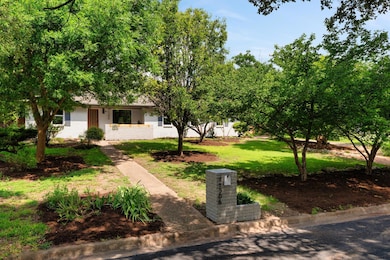 View of front of house with brick siding and a fr