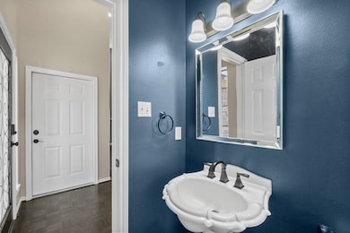 Half bath off entry way.