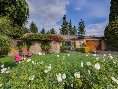 This gorgeous home has been exquisitely landscaped