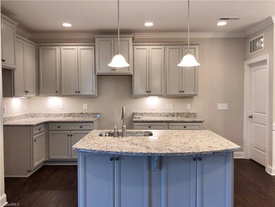 Kitchen with Painted Graystone Marsh Furniture cab