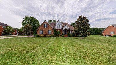 Beautifully landscaped yard just under an acre
