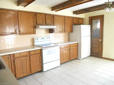 Ceramic tile with walk in pantry