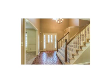 Two-story entry with new light fixture and upgrade
