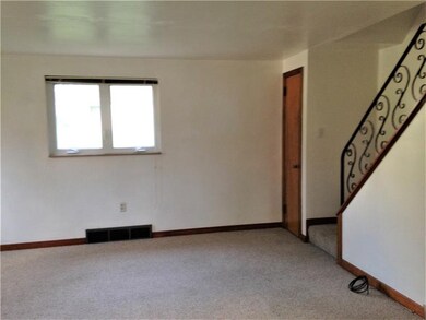 View of living room taken from dining room.