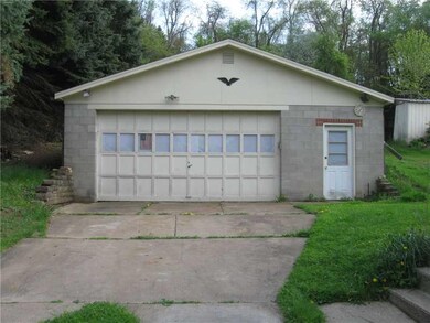 Parking Lot/Garage. 27 x 30 Block Garage