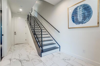 Entry from the front door and garage.