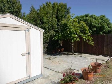  A second patio area with shed included, persimmon