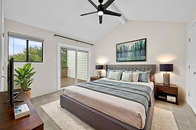 Carpeted bedroom with access to exterior and a ce
