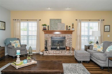 Brick fireplace with raised hearth.