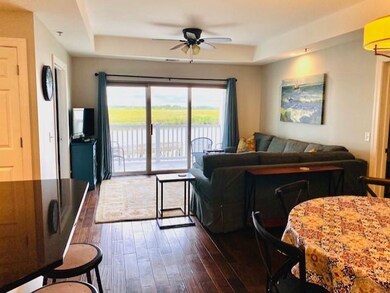 View of the River snd Marsh through 9 ft. sliding