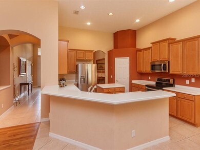 Central kitchen with stainless appliances
