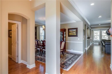 View from front entrance filled with natural light and space that gives a hint of what is to come without giving up your privacy.