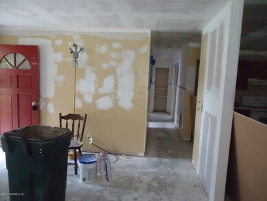 Front Door Entry needs paint & Flooring