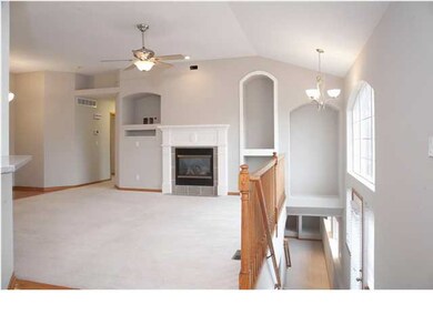 Living Room with High Ceilings & Gas Fireplace