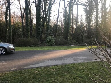 Service road behind condo for easy parking