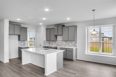 The Princeton II- Kitchen and Breakfast Area. Sample floor plan photo used for illustrative purposes only. Upgrades, selections options, windows and colors may vary.