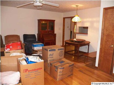 Living room with hardwood floors.