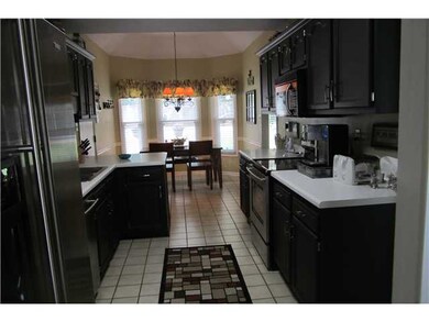 Updated kitchen features gorgeous black cabinets a