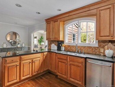Kitchen opens to family room and sunroom.  Room fo