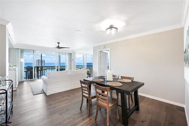 Dining area featuring ornamental molding, a water 