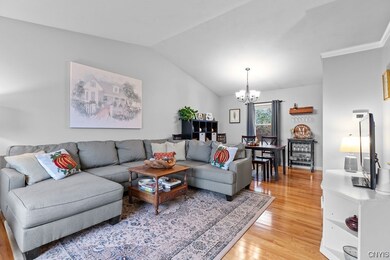 Formal living room open to the dining room. The va