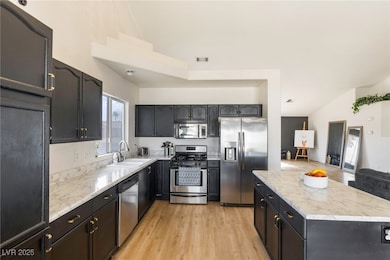 Designer details: quartz surfaces, black cabinets,