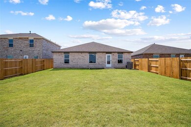 Backyard Bliss! This expansive, fully fenced backy