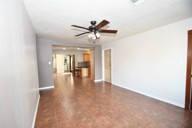 Home is completely tiled.  No carpet!