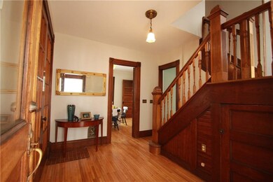Side entrance foyer! Gorgeous woodwork!