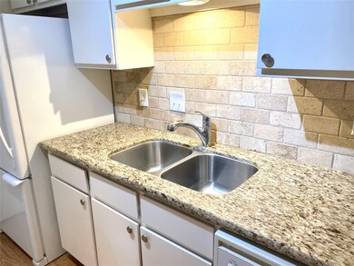 Tumble marble backsplash