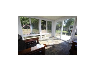 The 12'x12' Sun Room has tile floor, full view win