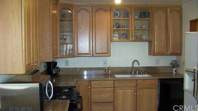Newer Kitchen Cabinets with glass inserts with Gra