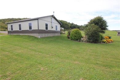 Beautiful gardens surround this entire home with l