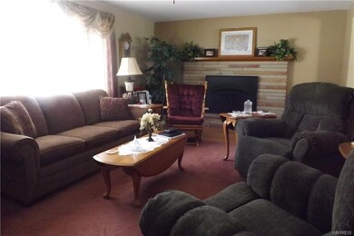 Cozy living room with gas fireplace.
