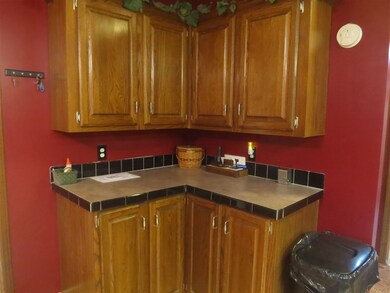 Corner cabinets in large, open kitchen
