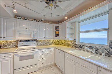 Updated kitchen has gorgeous DIRECT OCEAN VIEWS!
