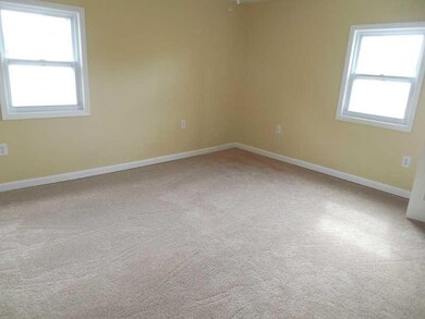 Master Bedroom. Situated  for privacy,  the master