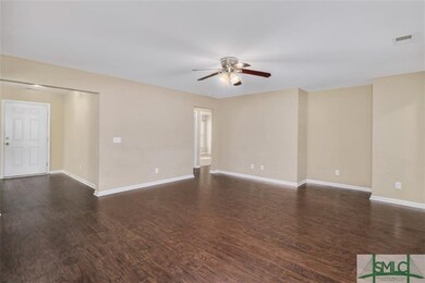 LIVING ROOM HAS NEW WOOD FLOORING, NEUTRAL PAINT A