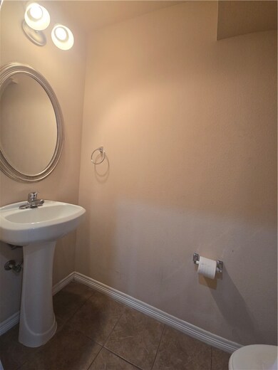 Bathroom featuring tile patterned floors