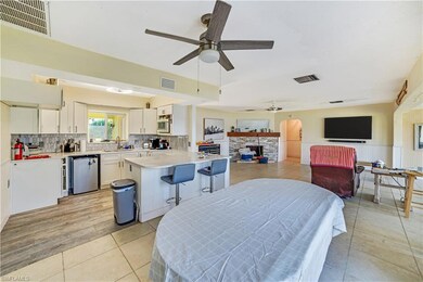 Dining room with light tile patterned flooring, ce