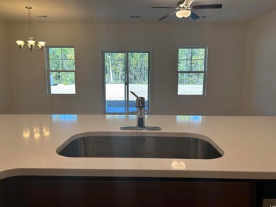 Kitchen with a healthy amount of sunlight, light c