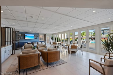 Common area featuring a drop ceiling and recessed lighting
