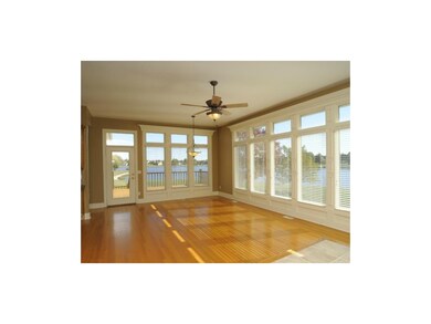 Great Room with Wood floors and View of Deck
