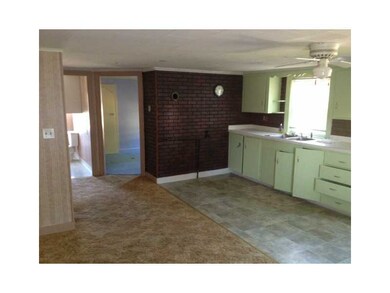 Exterior Front. Upstairs Apt