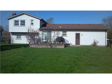 Exterior Back rear view of home showing raised con