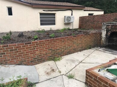 BACK PATIO WITH RAISED GARDEN