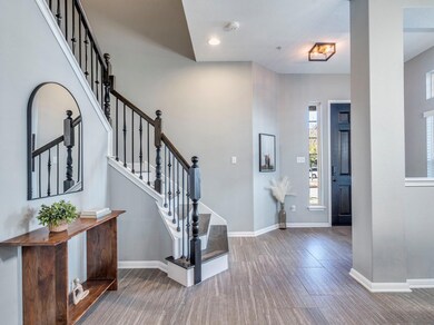 The large foyer welcomes you in and showcases the open floorplan.